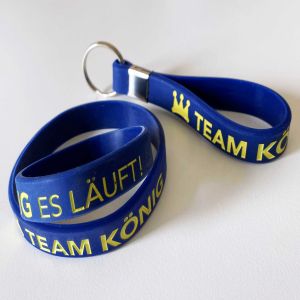 Armband und Schlüsselanhänger König Holding